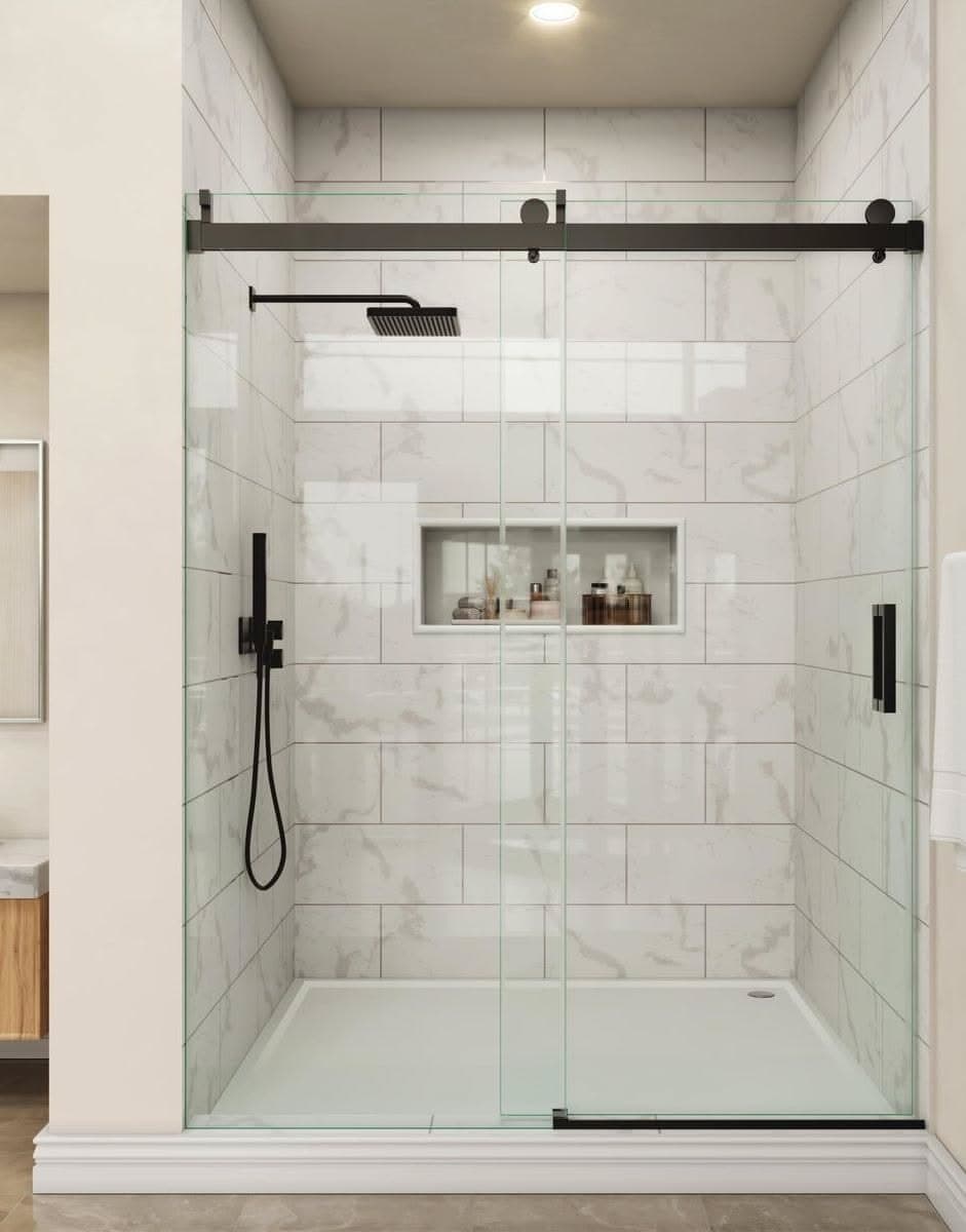Alcove shower with marble-look wall tile, recessed niche and sliding glass doors